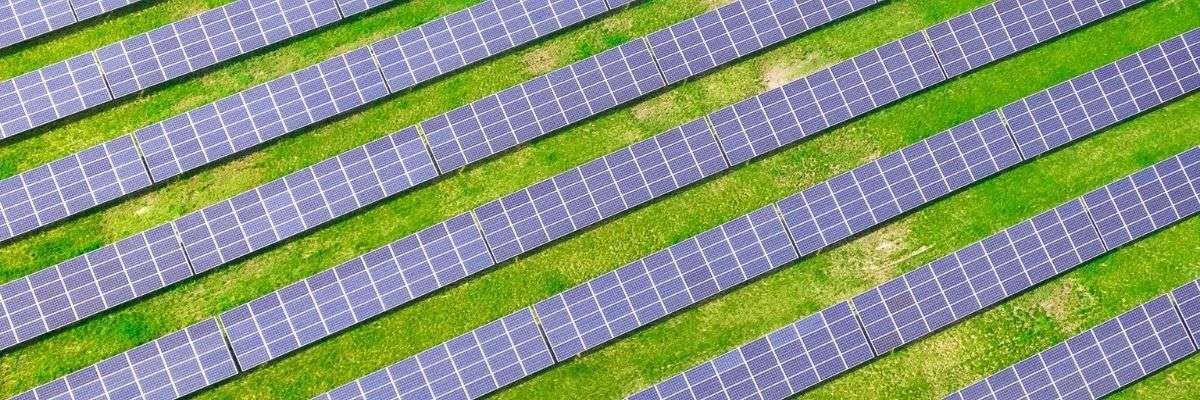 Rows of Solar Panels Green Field, YSG Solar
